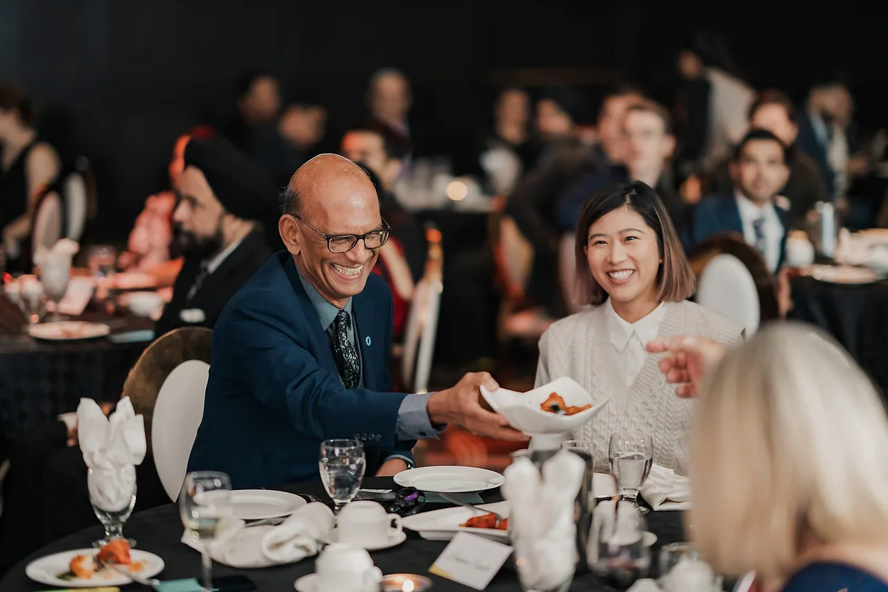 Guests at a dinner banquet table