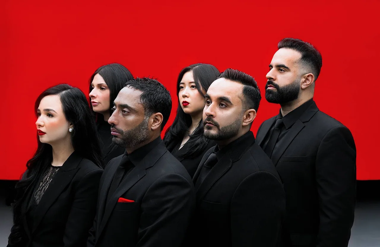 The Oberoi Group team against a red background
