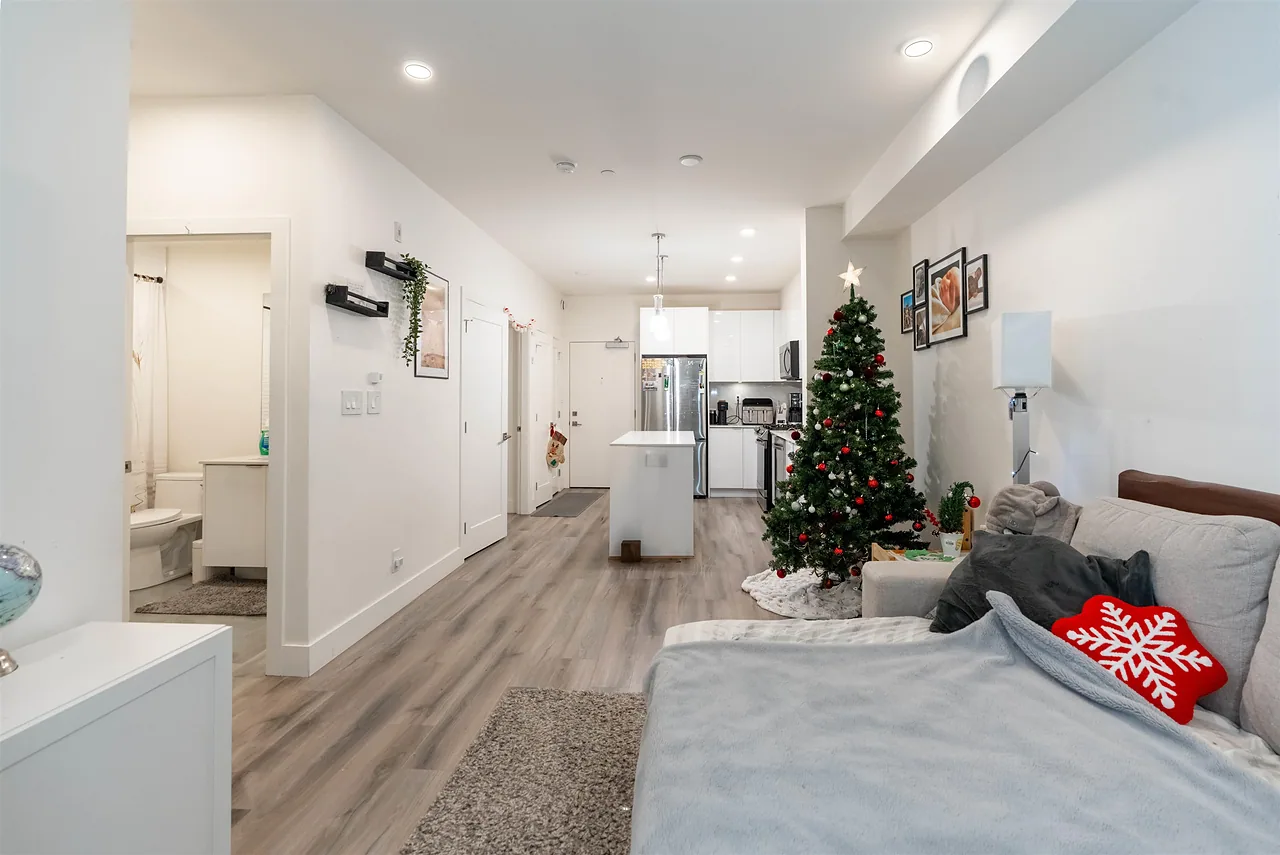 Open-plan suite with a living area and kitchen